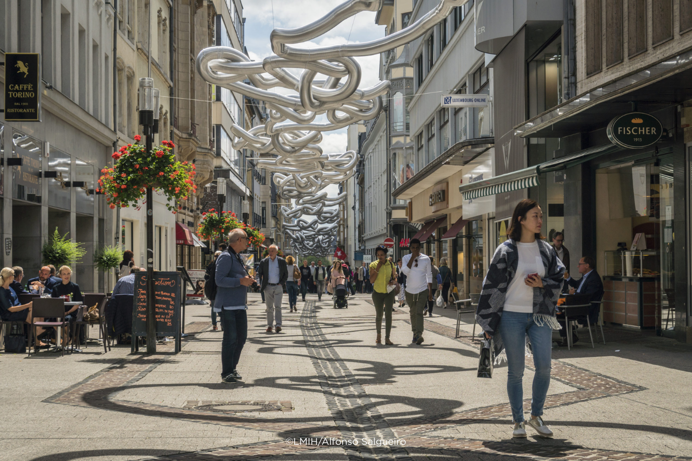 people walking in a decorated street