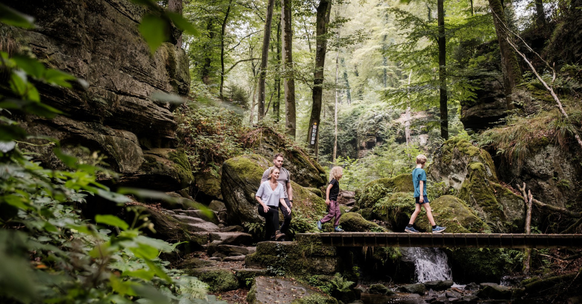 Family hiking in Luxembourg's Little Switzerland